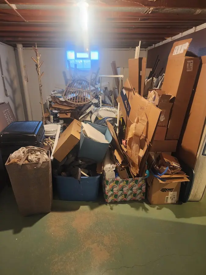 Roll-off dumpster container at job site for Yard Waste Dumpster Rental in Penfield